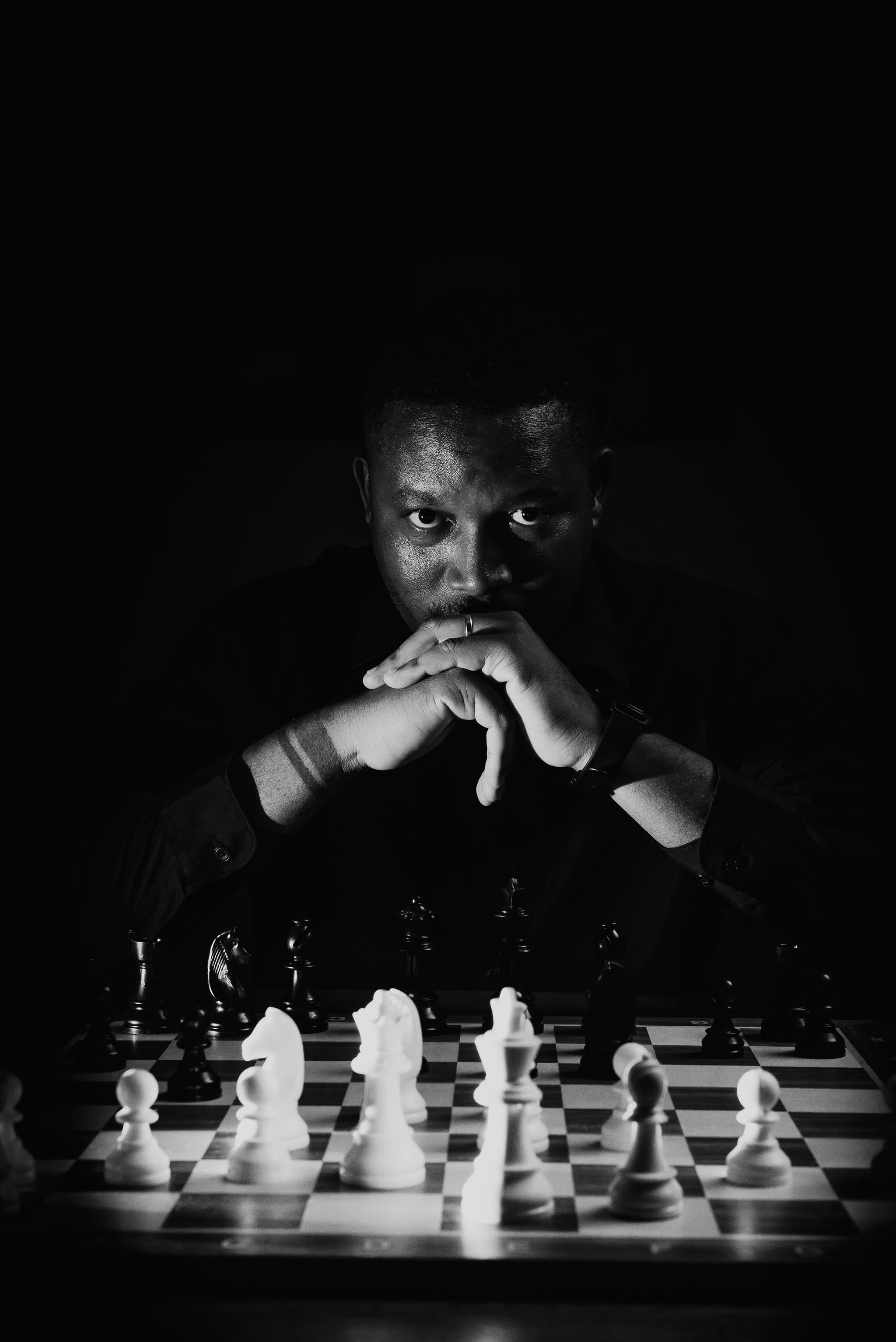 Guimarães Mahota — black-and-white editorial portrait for Thinking in the Dark